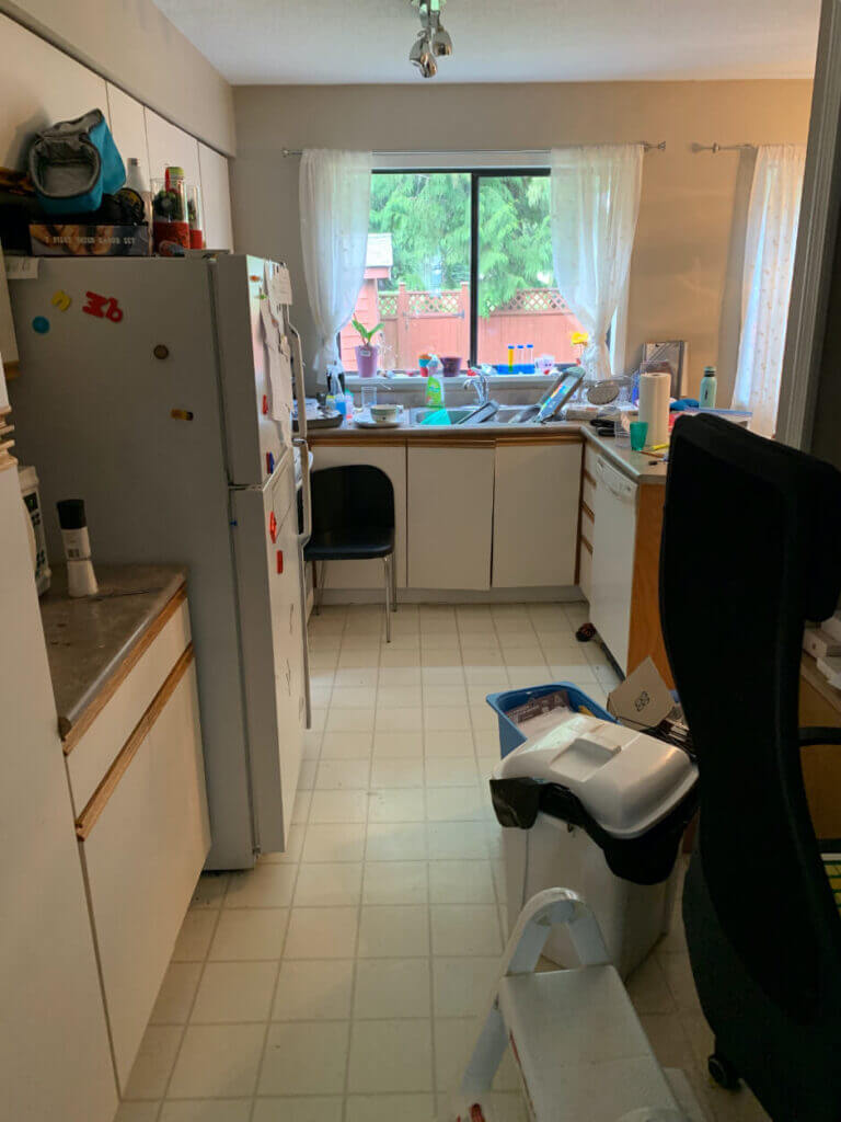 Old kitchen with outdated design.